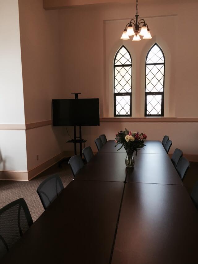 11137154_368184100037504_6974099493442014795_n Interior of gate house with tables set up for an event
