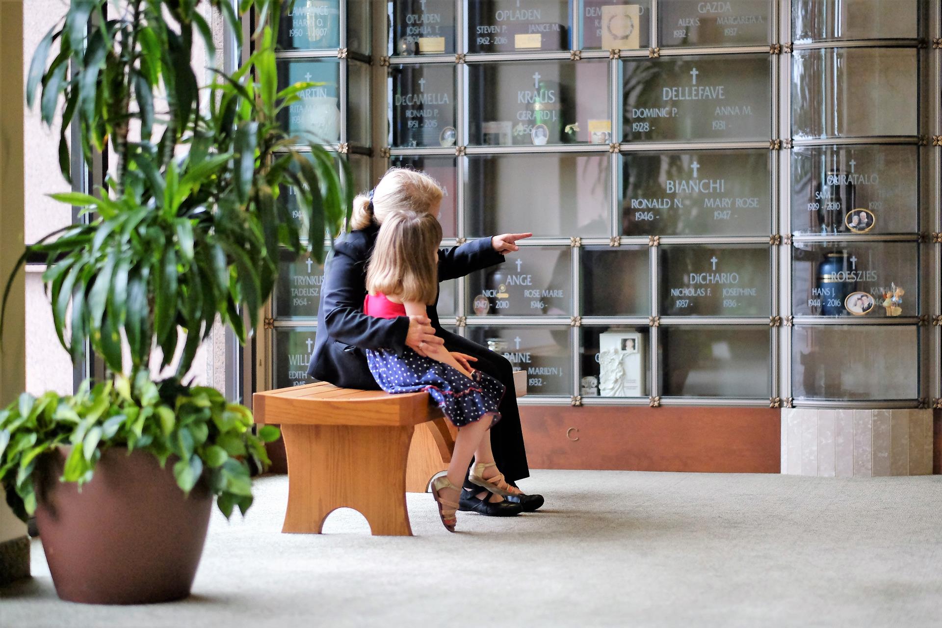 gallery-14 woman and child in front of glass front niches
