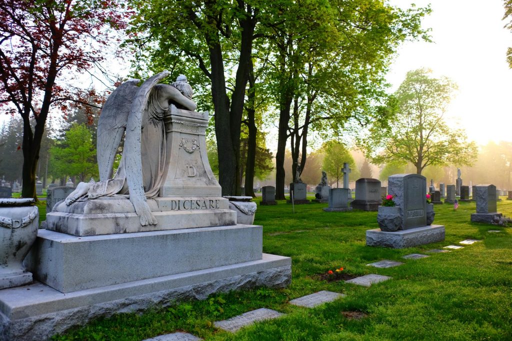 gallery-25 Photo of a tombstone with a weeping angel statue